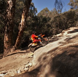 Trail bikes climbing the rock